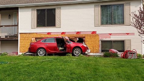 Car Crashes Into House In Plainfield Twp