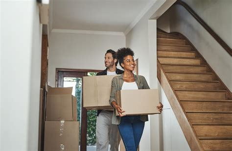 Premium Photo Excited Happy And Young Couple Moving Into A New Home