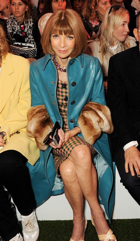 Anna Wintour Accented Her Fall Ready Dress With A Fur Trimmed Teal