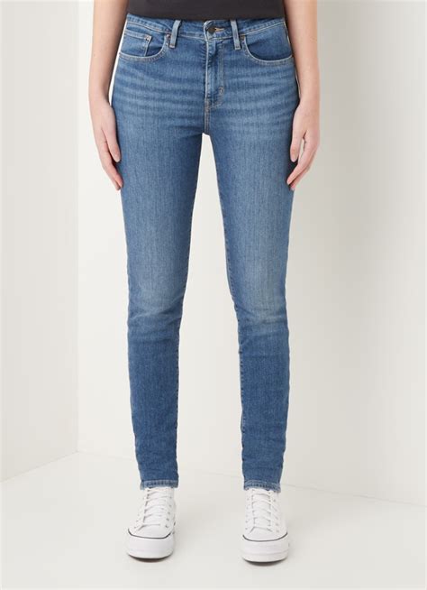 Levis 721 High Waist Skinny Fit Jeans Met Medium Wassing • Indigo • De