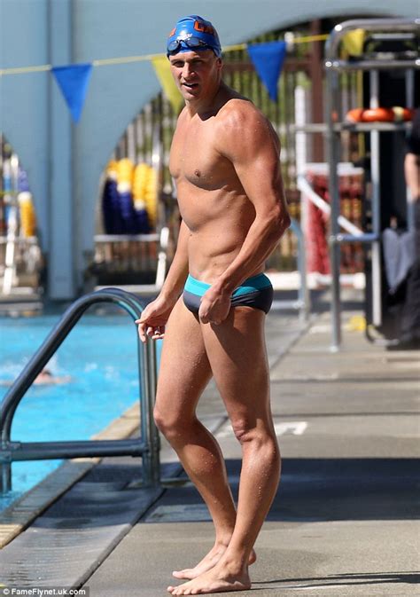 ryan lochte shows off his ripped body in tiny speedo for swim race daily mail online