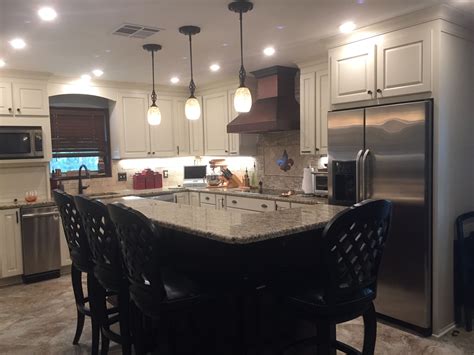 Black galaxy granite, with its black surface speckled with bronze chips, adds dimension to brown mahogany. Finished project: Remodeled Kitchen with copper vent hood ...