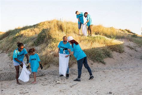 Volunteer Beach Clean Up By Stocksy Contributor Kkgas Beach Clean