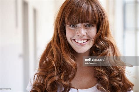 Laughing Redhead In Front Of A Window Photo Getty Images