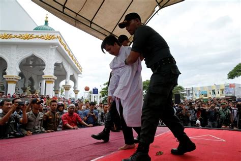 Two Men Publicly Caned In Indonesia For Having Gay Sex Photosimages