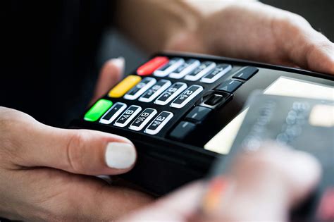 Leader in providing the best service and products like credit card terminals, pos systems and all the accessories you need. Retail Store Business Owner using Credit Card Terminal ...