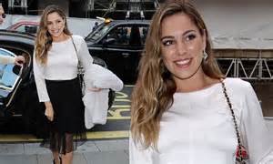Kelly Brook Flashes A Glimpse Of Her Abs In A Midi Skirt At Taking