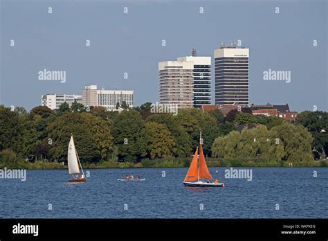 Mundsburg Tower Buildings Sailing Boats On Lake Outer Alster Hamburg