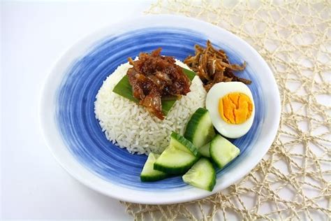This is a typical malay breakfast dish. Nasi Lemak With Sambal Ikan Bilis