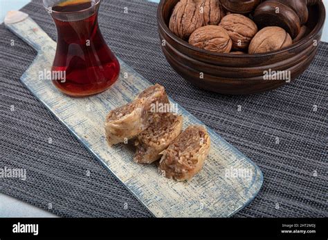 Traditional Turkish Dessert Walnut Baklava With Walnuts And Tea On A