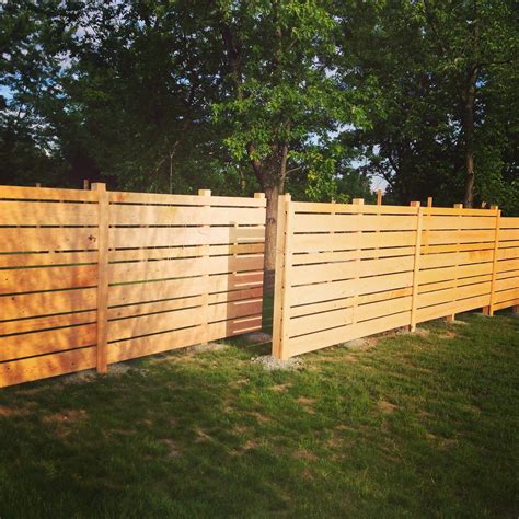 Diy Fence Made From Rough Cut Hemlock Horizontal Design Staggered