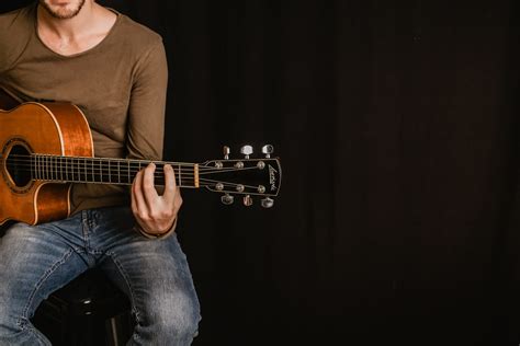 First off, let me make some there is more than one way to hold a guitar. How To Hold A Guitar Properly? Foolproof Guide - Guitar Lesson Dublin