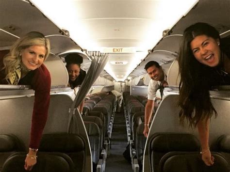 Female Flight Attendants Forced Into Overhead Luggage Compartments In