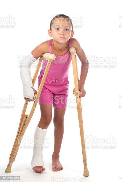 Girl With Crutches Stock Photo Download Image Now Crutch Girls