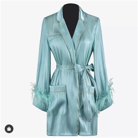 Blue robe dress with gold trim and feathers detail... - Depop