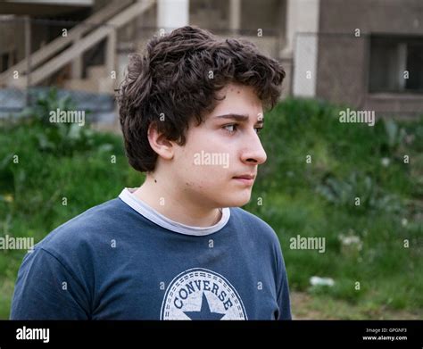 Teenage Boy Looking Away Stock Photo Alamy