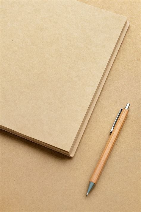 Natural Brown Paper Notebook With A Pencil Premium Image By Rawpixel