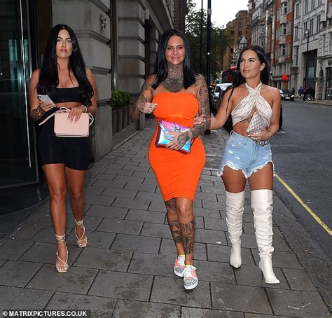 Jemma Lucy Flaunts Her Curves In An Orange Bodycon Dress As She Steps