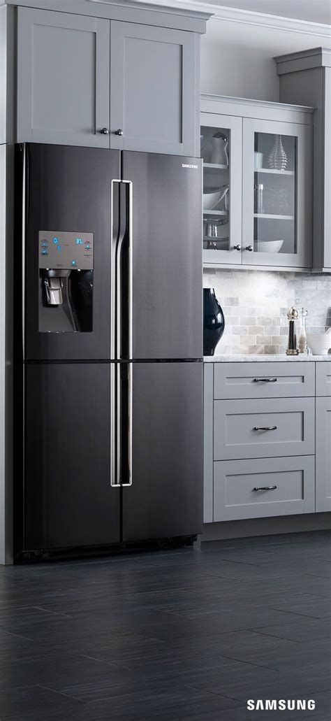 Introduce a warm ambiance into your kitchen with the newest trend in kitchen design. Kitchens with Black and Stainless Steel Appliances ...