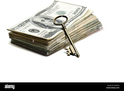 Wealth And Riches Represented By Cash Money And A Key Stock Photo Alamy