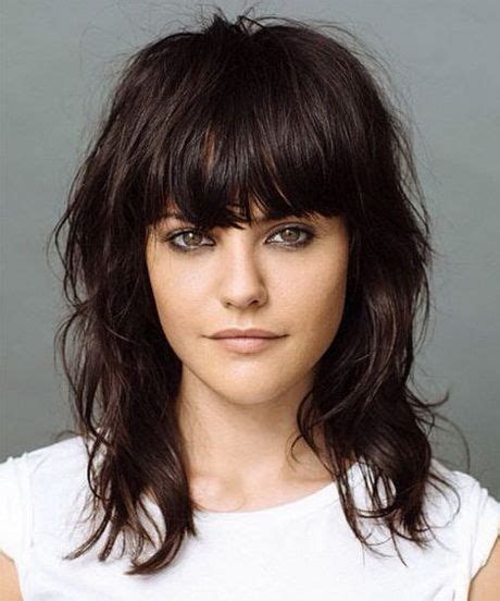 50 medium length haircuts with bangs to elevate your look