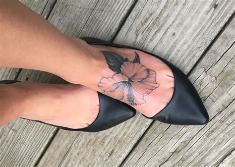 Black Great And White Hibiscus Tattoo Done By Johnny Truant At