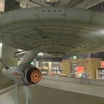 The museum features a display of nearly 300 aircraft spread out over 80 acres (320,000 m²) on a campus occupying 127 acres. Smithsonian National Air & Space Museum: Gift shop ...