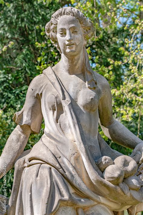 Ancient Decayed Statue Of A Sensual Renaissance Era Woman In The Central City Park Of Potsdam A