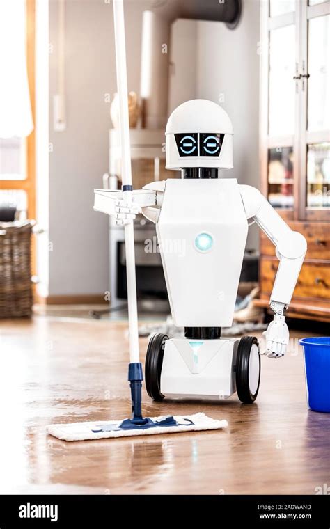 Automatic Robot Floor Scrubber Is Doing His Work In An Living Room