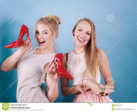 Women Presenting High Heels Shoes Stock Photo Image Of Fashionable
