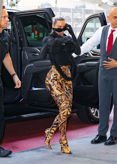 Kim Kardashian Spotted Wearing Balenciaga Credit Card Earrings