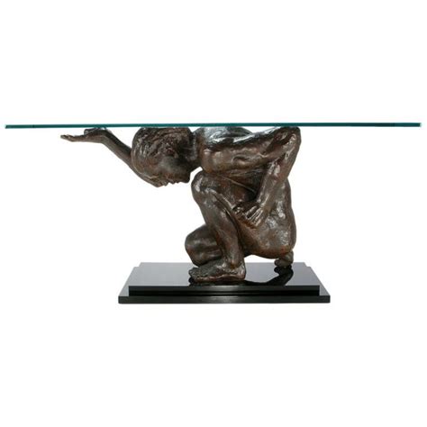 Traditional console table—pretty brass pulls, simple cabriole legs, two drawers and a scalloped top. Life-Size Bronze Finish Atlas Sculpture Console Table ...