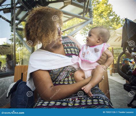 African American Mother Holds Her Baby Stock Photo Image Of