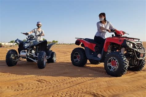 Desert Safari With Bbq Quad Bike And Camel Ride 2024 Dubai