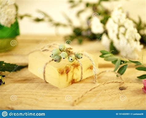 Soaps are made by mixing plant personally, i don't consider soap to be natural. Natural Soap, Plants And Berries On A Wooden Table Stock ...