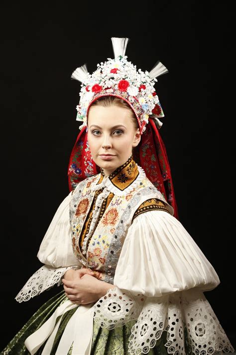 The national clothing of the czech republic is very bright. A beautiful bride from the Moravian area of the Czech ...