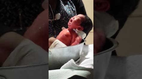 Your baby's first bath is a special event. Newborn baby's first bath at the hospital - YouTube