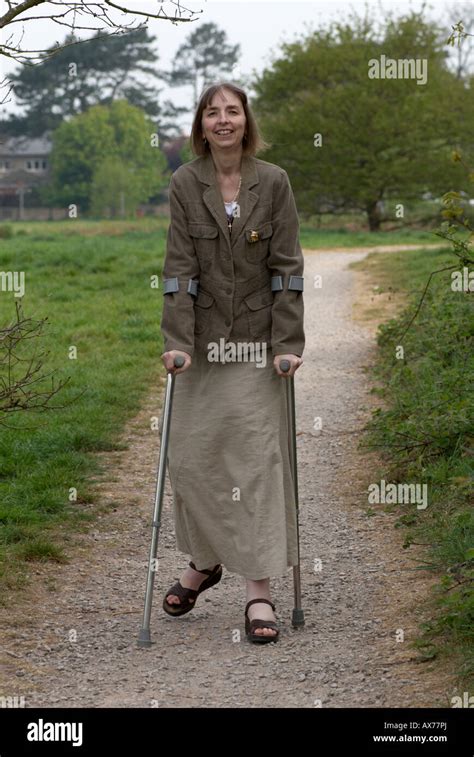 Lady Walking With Crutches Stock Photo 16751993 Alamy