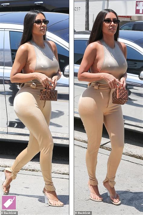 Kim Kardashian Goes Braless In Skintight Bodysuit To Promote New Body