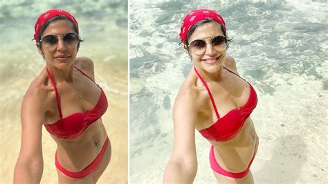mandira bedi raises hotness as she flaunts hot and sexy body in red bikini trendingstills