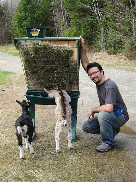 Cut the hanger in two pieces and then make a 90 degrees angle with the pieces, make a little hole in the rack and put the hanger into the hole (paste with wood. Easy DIY hay rack plan from gotgoats.com Be sure bar spacing allows enough room for the goats ...