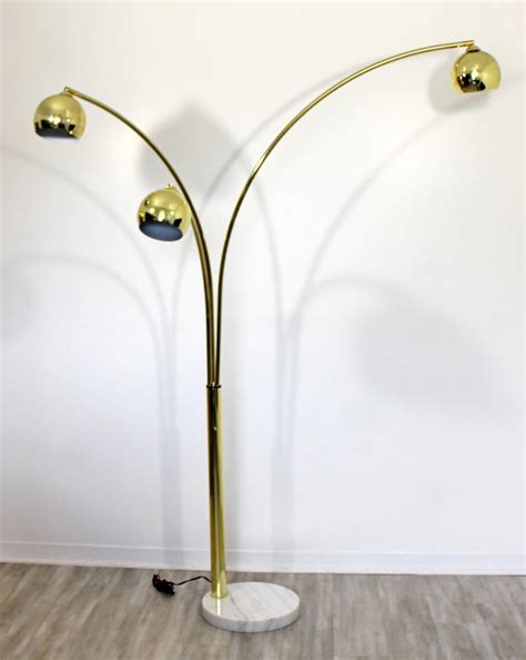 Magnolia mosaic bronze downbridge arc floor lamp. Mid-Century Modern 3-Arm Brass Articulating Arc Floor Lamp White Marble Base at 1stdibs
