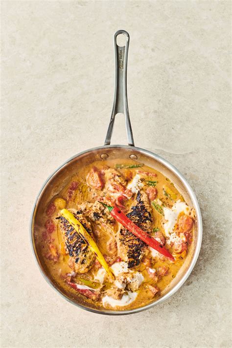 Remove the gnarly chicken from the pan and go in with the tomatoes, chopped chillies and cashew butter. Jamie Oliver's butter chicken | Woolworths TASTE