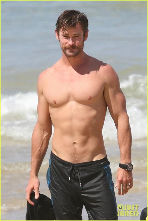 Chris Hemsworth Puts His Ripped Shirtless Body On Display As He Soaks