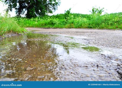 The Road Is Wet Wet Asphalt After Rain Water Flows Stock Photo