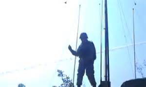 Soldier Does The Carlton Dance As Rocket Launches Behind Him