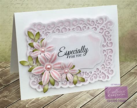 Mixed floral arrangement in a light blue vase with casablanca lilies, stock, spider mums, carnations, snap dragons, roses, liatris, wax flowers, alstromeria, gerbera daisy, and delphinium. Verity Cards: Especially for you