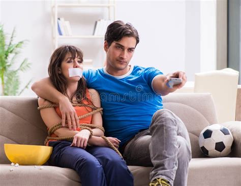 The Man Tying Up His Wife To Watch Sports Football Stock Image Image Of Ball Football 111746513