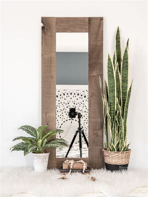 We're back with another diy project from our budget bathroom makeover series! DIY Rustic Mirror Frame - The Navage Patch