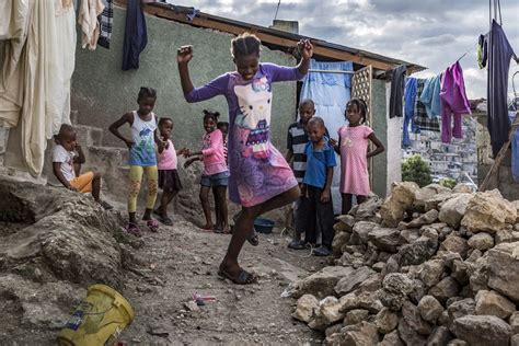 Eking Out A Living In Haitis Colourful Slum City Bbc News